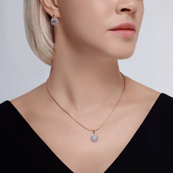 Серьги из красного золота с топазами и фианитами