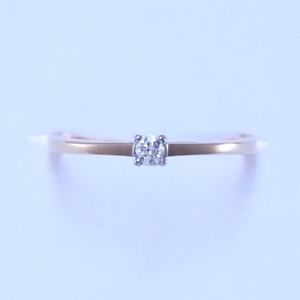 Кольцо из красного золота с бриллиантом