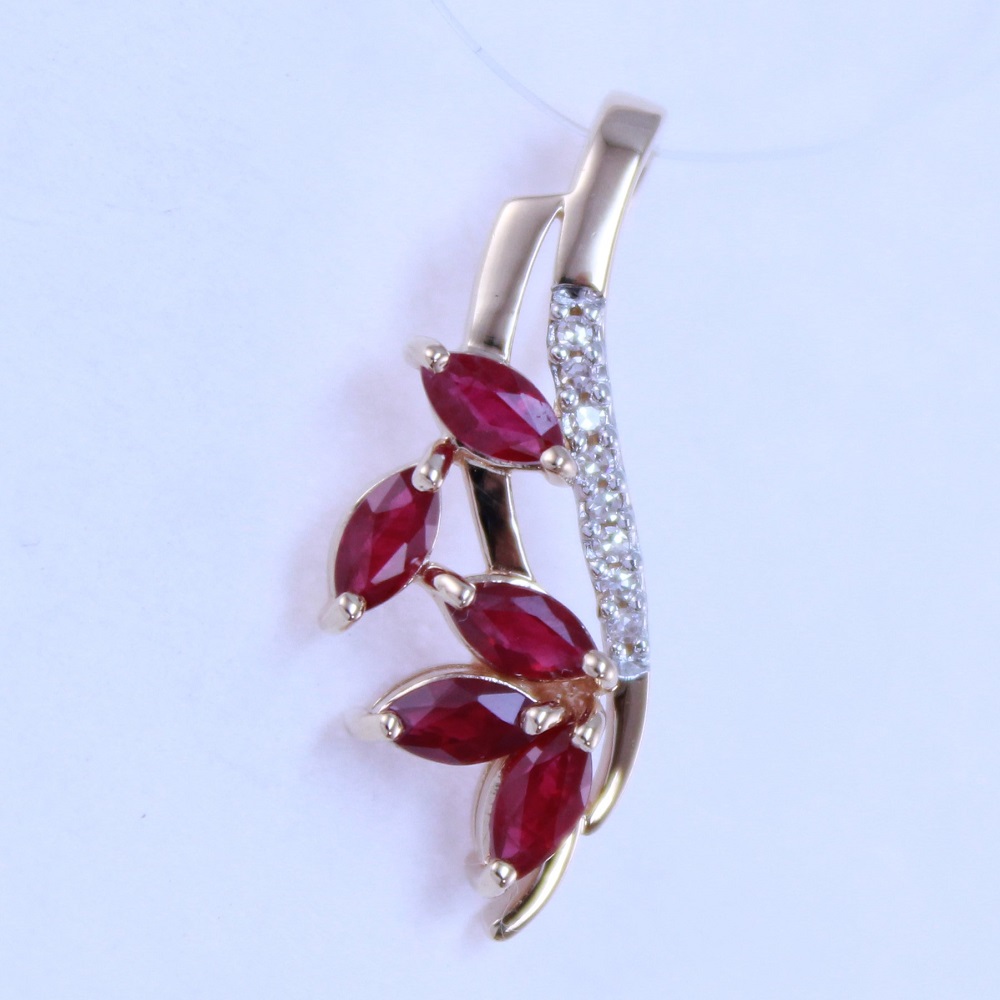 Подвеска из красного золота с рубинами и бриллиантами