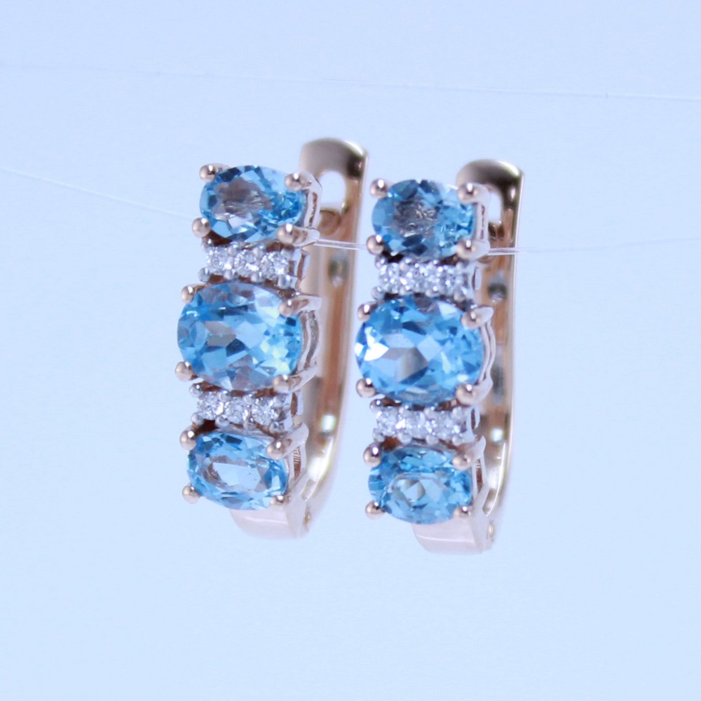 Серьги из красного золота с топазами и бриллиантами