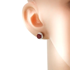Серьги пусеты из серебра с корундами и цирконами