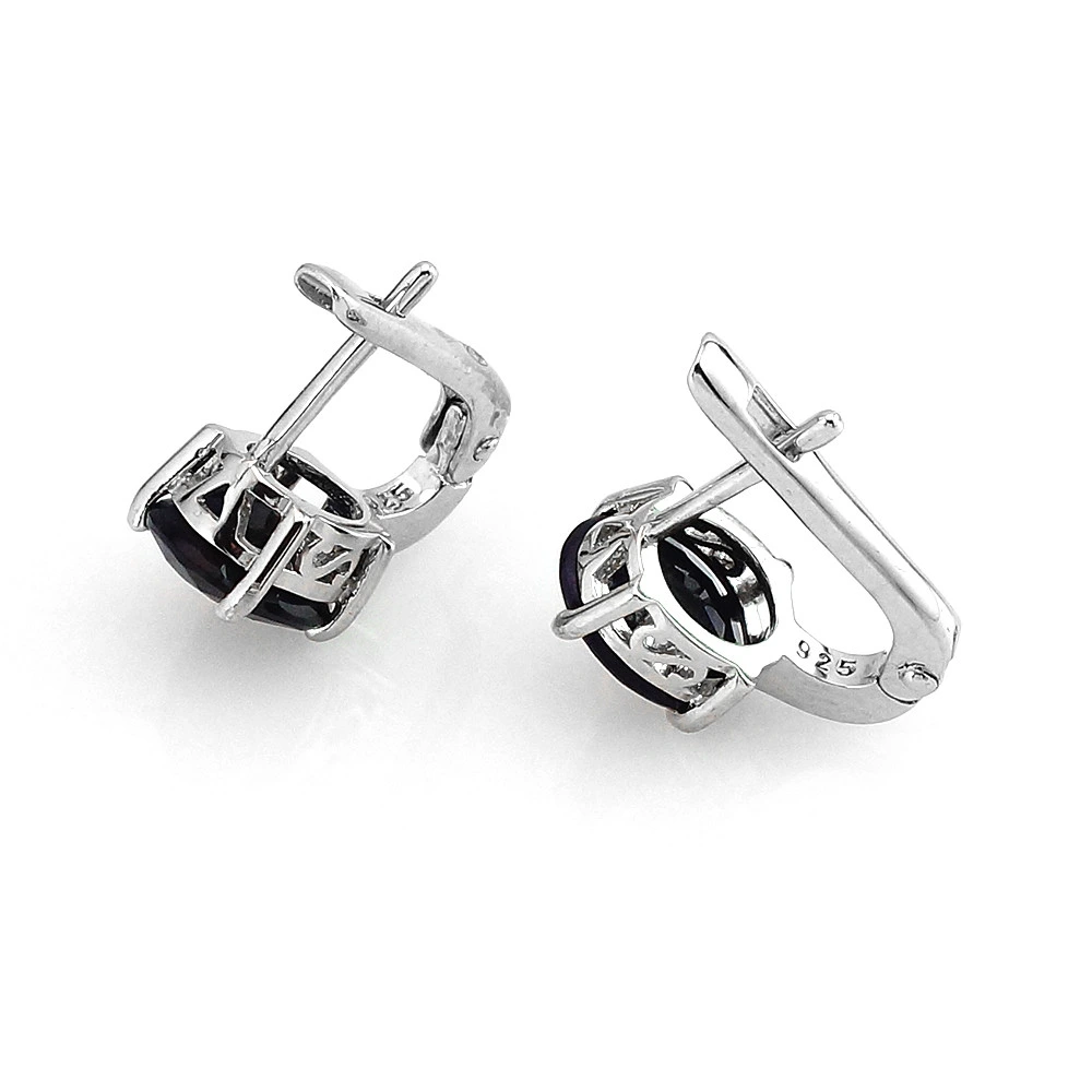 Серьги из серебра с корундами