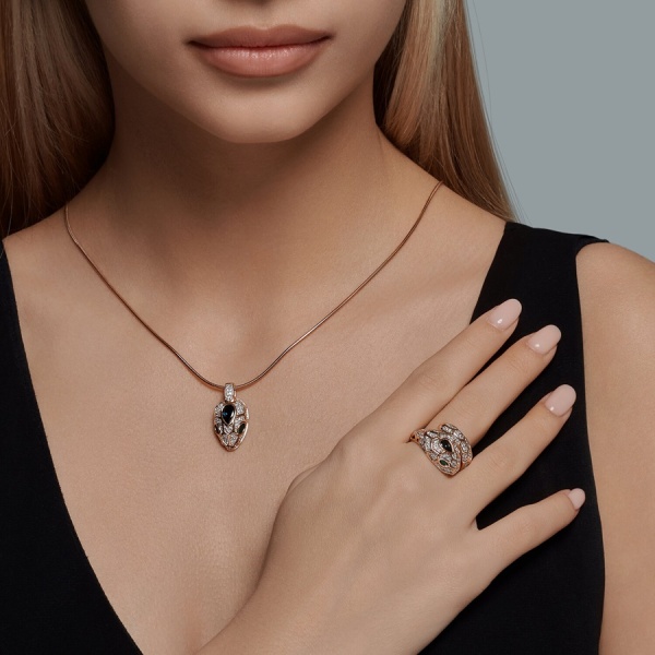 Подвеска из красного золота с агатами, топазом и фианитами