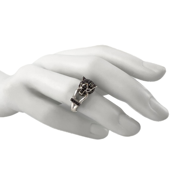 Кольцо из серебра в виде головы пантеры с цирконом