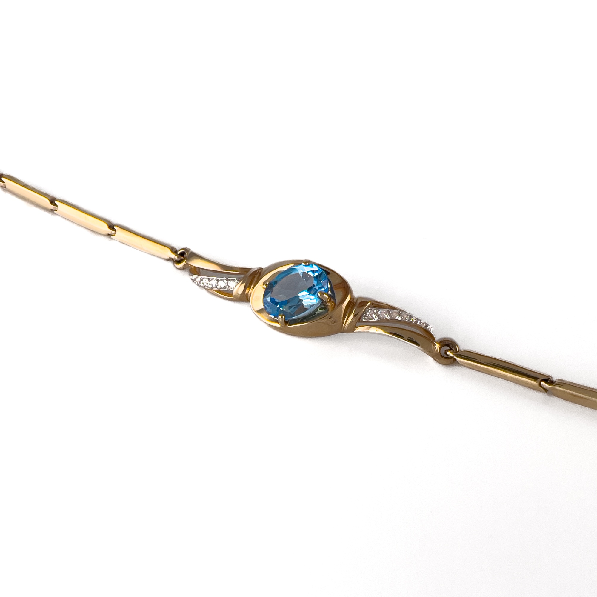 Браслет из золота с топазом и фианитами