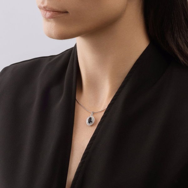 Подвеска из белого золота с топазом и фианитами