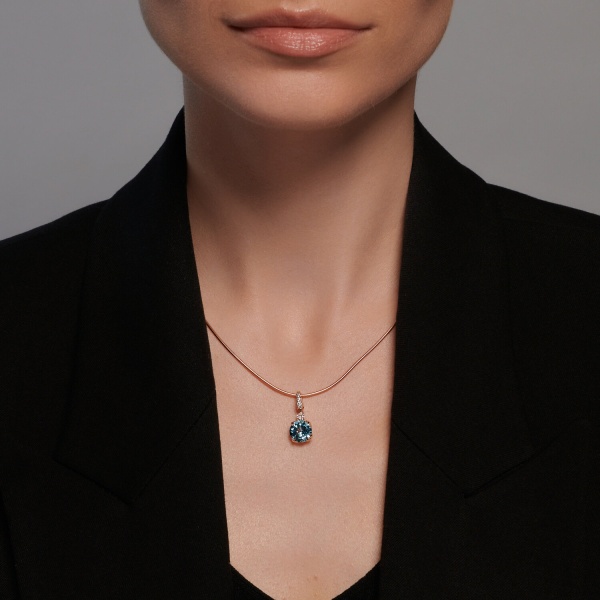 Подвеска из красного золота с топазом и фианитами