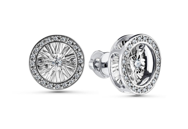 Серьги пусеты из белого золота с танцующим бриллиантом